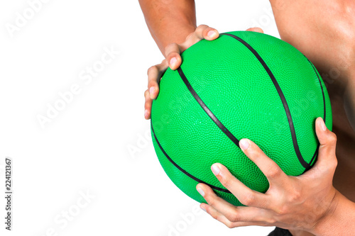 Basketball green ball in sportsman hand isolated on white background , objects copy space © suphaporn