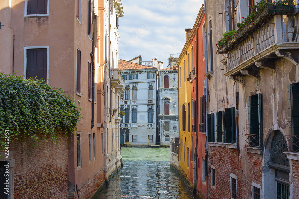 walk along the canals of Venice