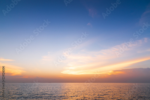 Canvas Print Sunset sky background over the sae.Nature background.