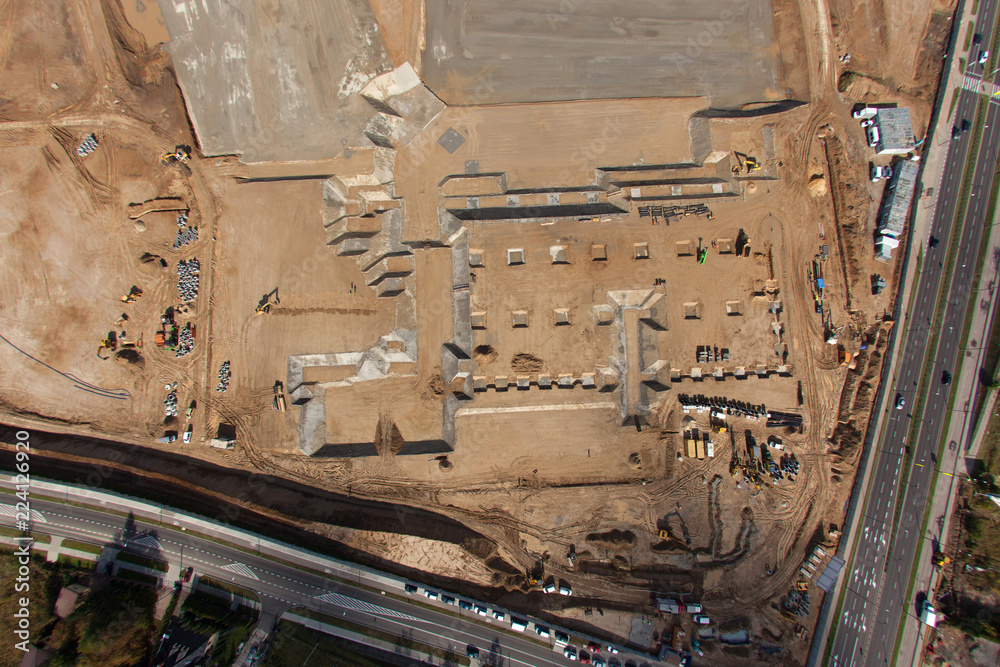 Aerial view of industrial zone with new construction site.
Aerial view of industrial zone with new construction site.