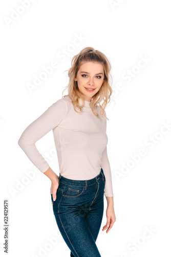 portrait of beautiful young blonde woman smiling at camera isolated on white © LIGHTFIELD STUDIOS