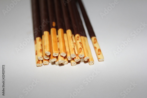 Chocolate dipped biscuits sticks - pocky candy  photo