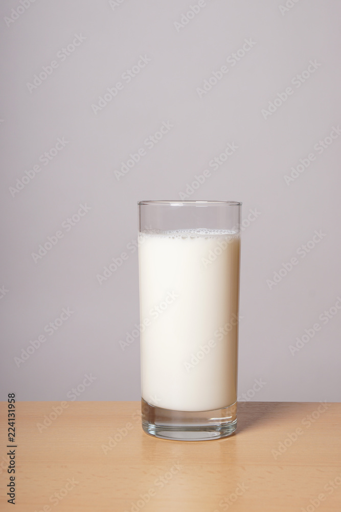 glass of milk on table with copy space glass of milk on table with copy space