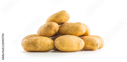 A pile washed potatoes isolated on white.