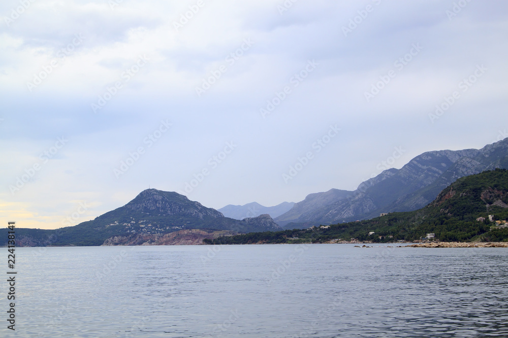landscape with Adriatic sea, mountains and clouds near Bar in Montenegro