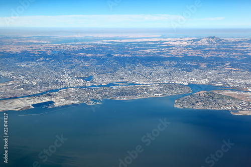 San Francisco Bay Area: Aerial View of east bay region showing the cities of Oakland, Berkeley and Alameda Island photo