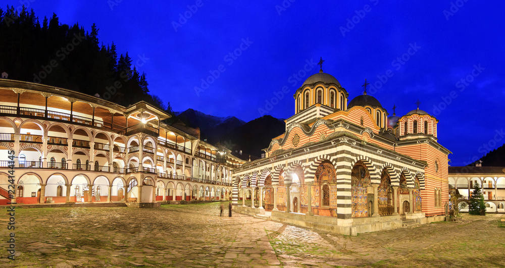 Beautiful panoramic panorama at night of the Orthodox Rila Monastery, a famous tourist attraction and cultural heritage monument in the Rila Nature Park mountains in Bulgaria