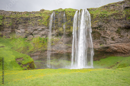 waterfall in iceland in the mountain