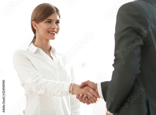 handshake young business woman with a colleague © ASDF