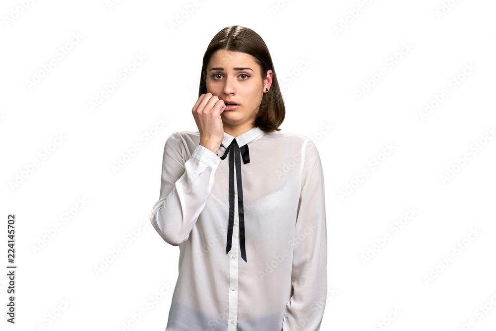 Portrait of unhappy surprised business woman. Young anxious woman isolated on white background. Portrait of unhappy surprised business woman. Young anxious woman isolated on white background.