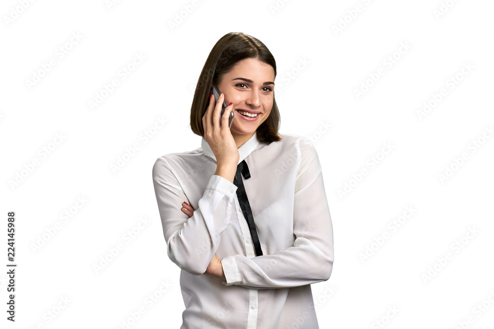 Happy business woman talking on phone. Smiling girl speaking on cell phone, isolated on white background. Happy business woman talking on phone. Smiling girl speaking on cell phone, isolated on white background.