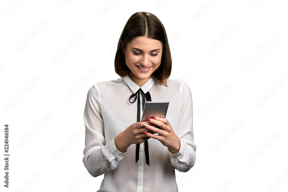 Portrait of smiling woman with smartphone. Happy cheerful woman texting message on phone, isolated on white background. People, technology, lifestyle. Portrait of smiling woman with smartphone. Happy cheerful woman texting message on phone, isolated on white background. People, technology, lifestyle.