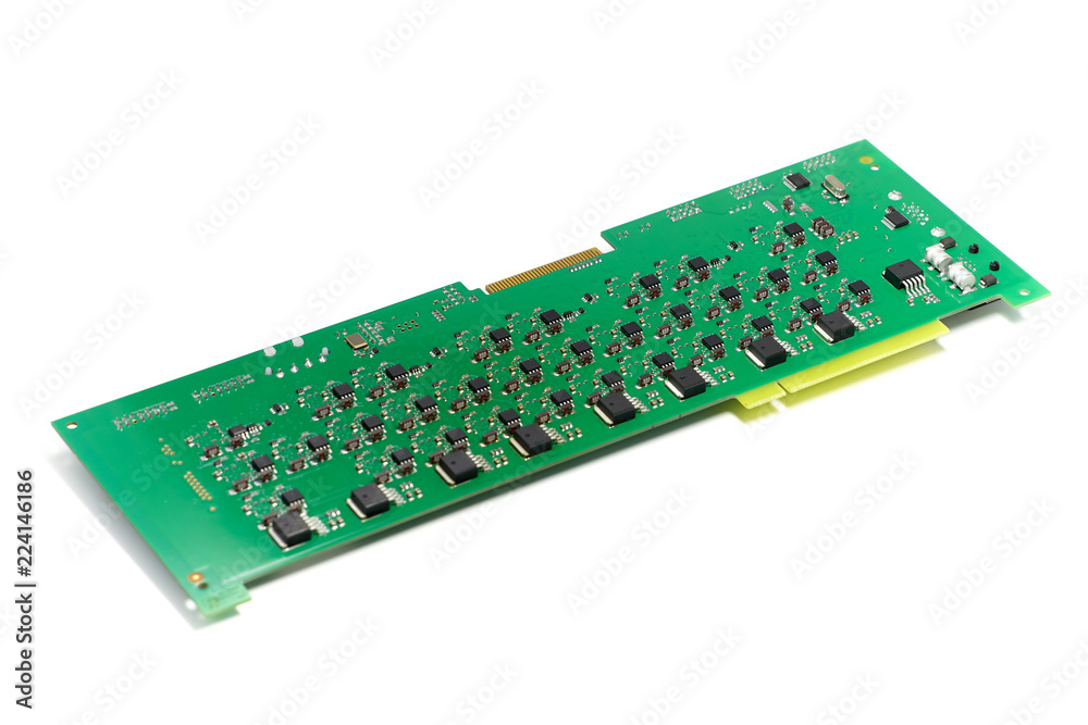 Electronic printed circuit board with chips and other components, green color, back side, angled view, isolated on white background