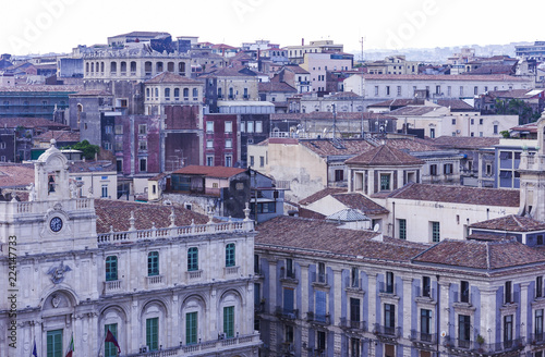 Catania rooftops and cityscape at sunrise in the background, Sicily, Italy
