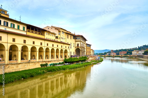 River Arno next to Art Museum "Uffizi Gallery" in Florence in Italy / Seen from famous "Ponte Vecchio"