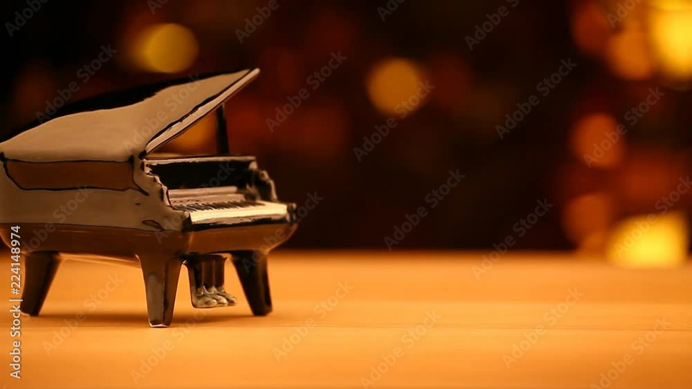 Black piano gold bokeh hd footage