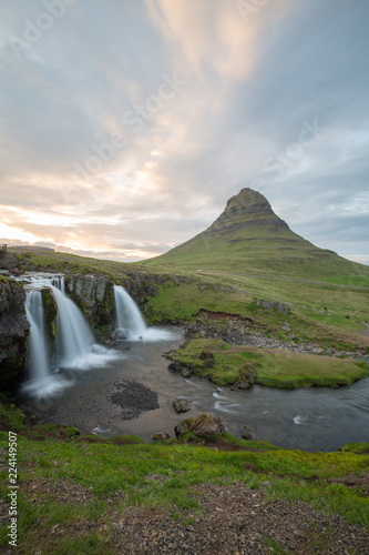 waterfall in iceland in the mountain