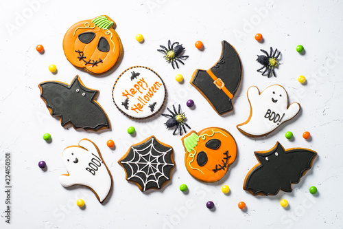 Halloween food bakground -Gingerbread Cookies on white table.