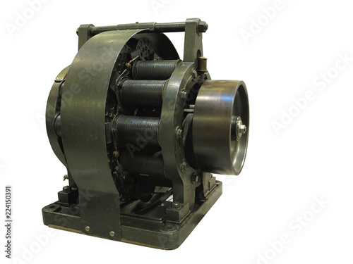 Vintage old industrial equipment powerful electric motor isolated over white