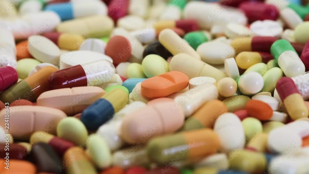 Different pills spinning in a closeup seamless loop Different pills spinning in a closeup seamless loop