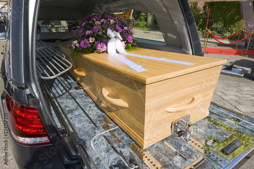 Coffin in funeral car