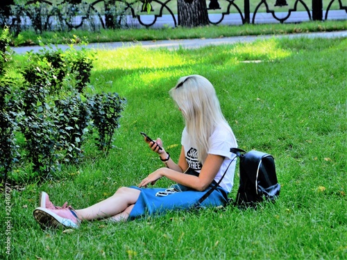 The girl in the Park with the phone.