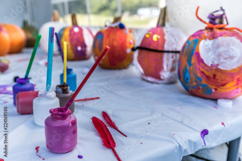 Halloween pumpkins painting in the fall photo