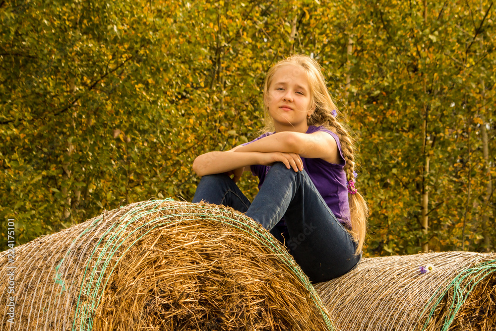 beautiful girl enjoying the autumn sun beautiful girl enjoying the autumn sun