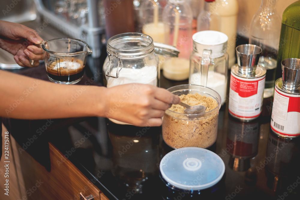 Barista preparing coffee for make iced coffee