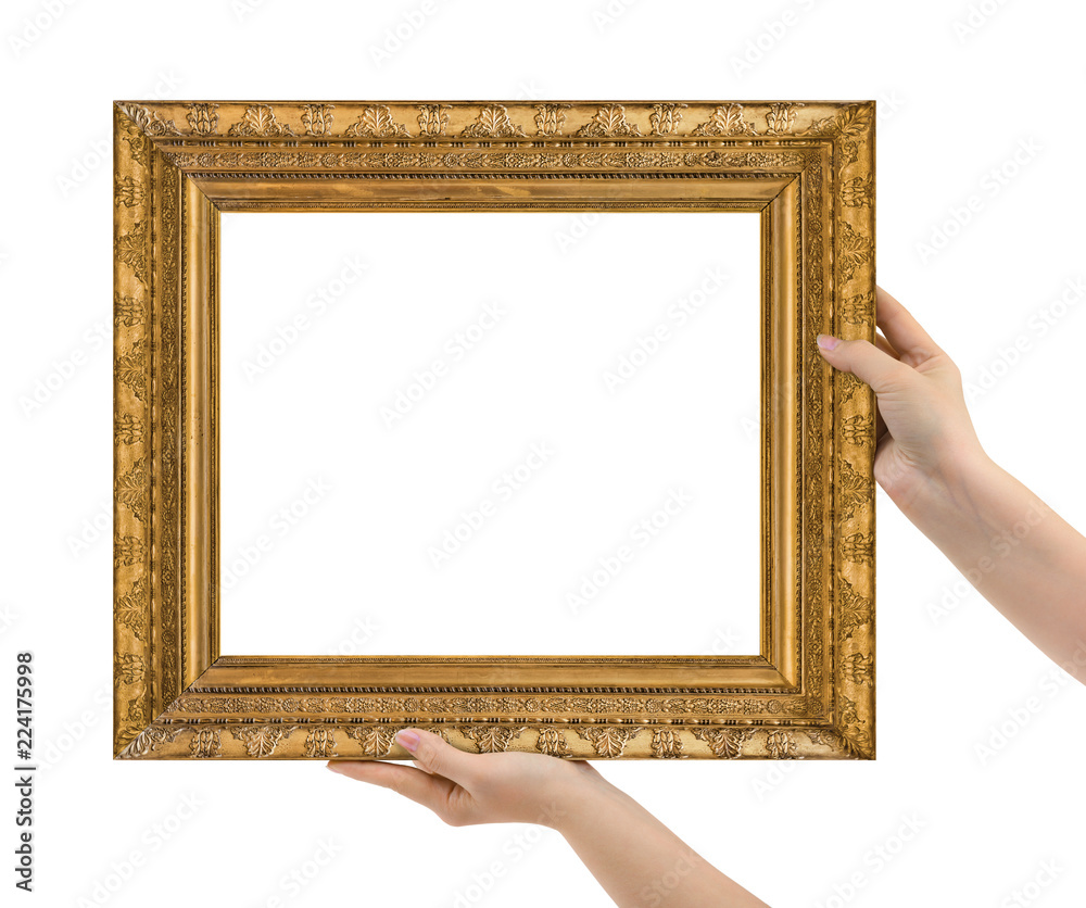 Wooden picture frame in hands Wooden picture frame in hands