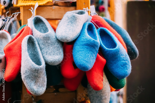 Close View Of Various Colorful European Felt Boots Or Slippers A photo