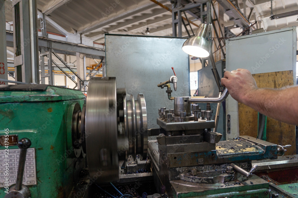 Processing of metal on the machine. Turning work in production. Processing of metal on the machine. Turning work in production.