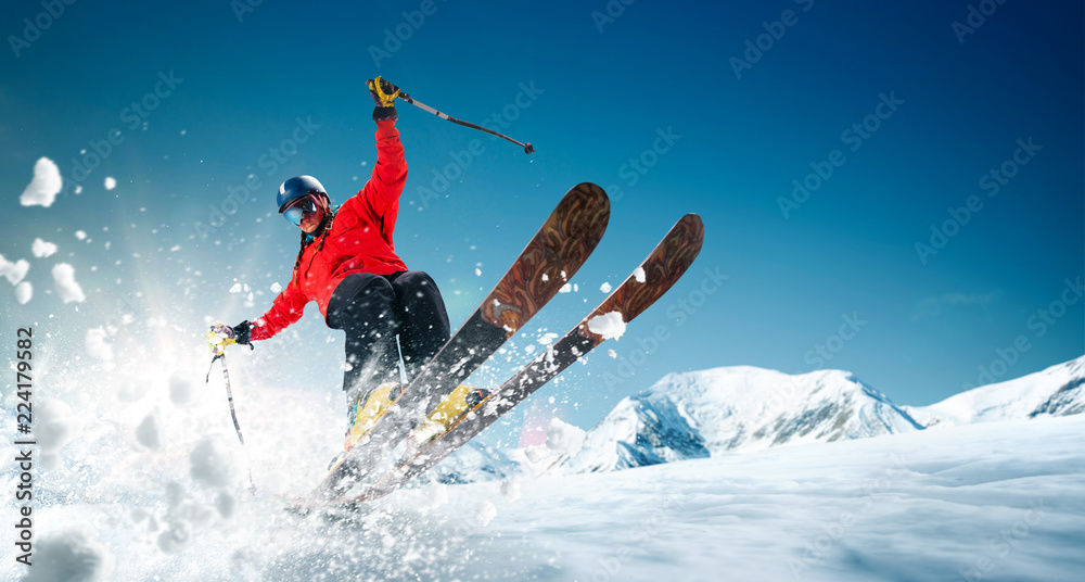 Skiing. Jumping skier. Extreme winter sports. - obrazy, fototapety, plakaty 