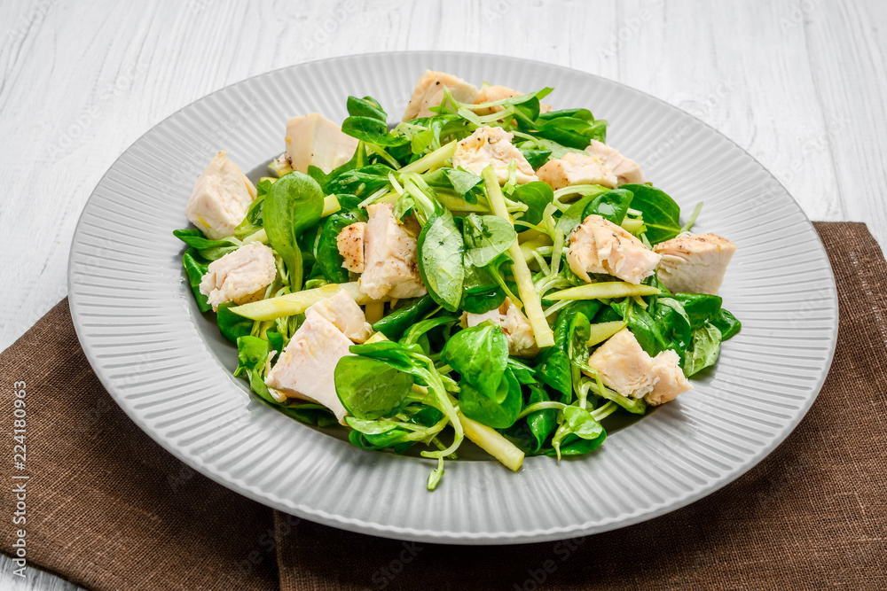 Healthy food, salad with chicken grilled with lettuce