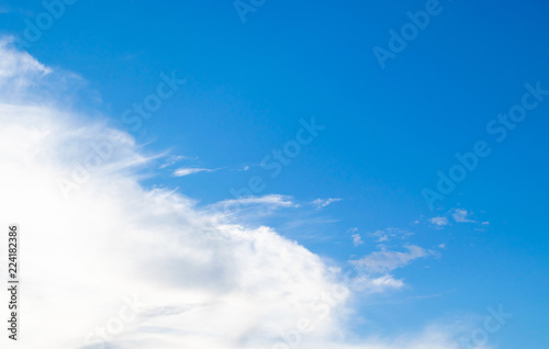 Blue sky with soft white cloudy atmosphere is clear and clean.