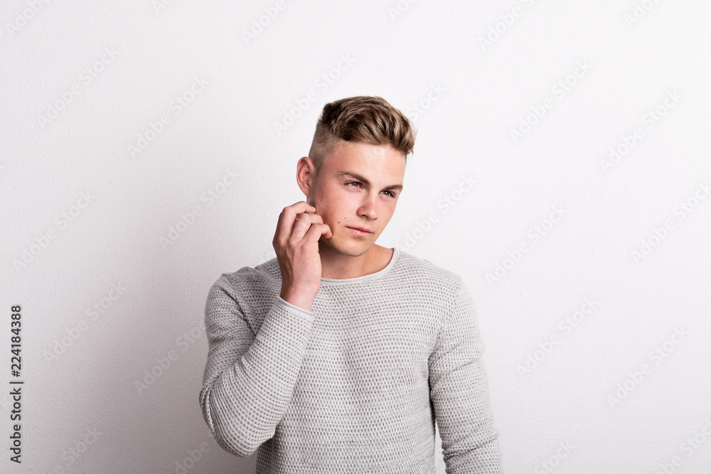Portrait of a young man in a studio. Copy space. Portrait of a young man in a studio. Copy space.