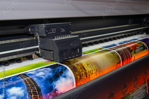 Photo Large format printing machine in operation. Industry