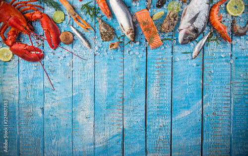 Wallpaper Mural Fresh tasty seafood served on old wooden table.