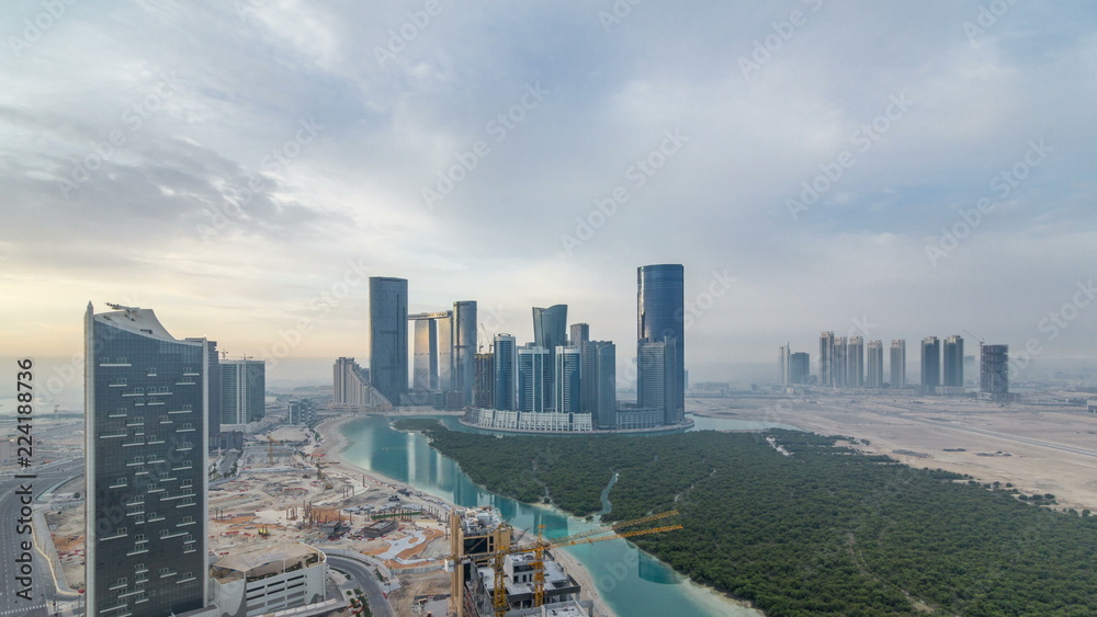 Obraz premium Buildings on Al Reem island in Abu Dhabi timelapse from above.