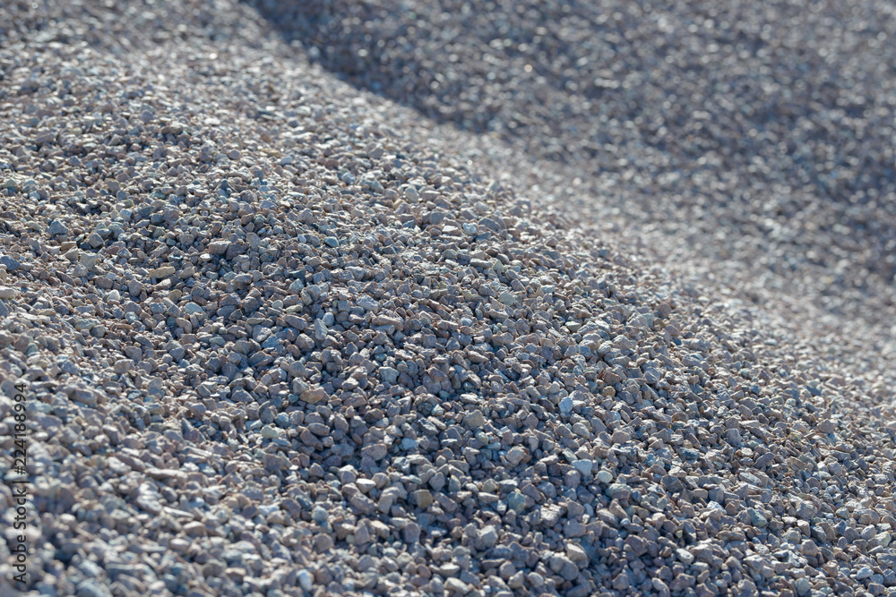Breakstone background. Road gravel. Gravel texture. Crushed Gravel background. Piles of limestone rocks. Break stones on construction site. Breakstone background. Road gravel. Gravel texture. Crushed Gravel background. Piles of limestone rocks. Break stones on construction site.