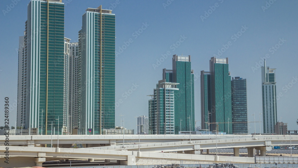 Modern buildings in Abu Dhabi skyline timelapse with operpath.