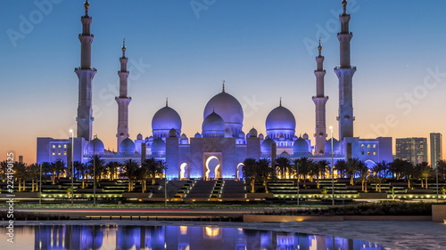 Sheikh Zayed Grand Mosque in Abu Dhabi day to night timelapse after sunset, UAE