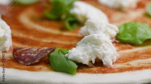 Preparing fresh italian pizza in restaurant,camera panning