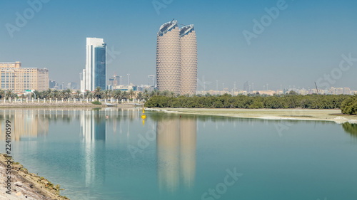 Fotografia View of skyscrapers skyline with Al Bahr towers in Abu Dhabi timelapse