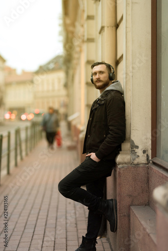 Wallpaper Mural Portrait of a handsome young hipster man in an urban environment. Torontodigital.ca