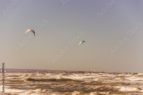 Kitesurfing on the sandy and windy beaches of Ostuni in Salento on the Adriatic sea