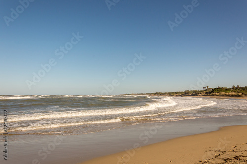 Waves on the sandy beaches of Ostuni in Salento on the Adriatic sea