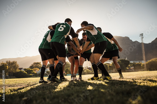 Photography Rugby players cheering and celebrating win
