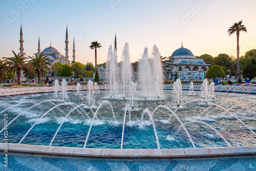 Fountain and The Sultan Ahmed Mosque in Istanbul during sunset