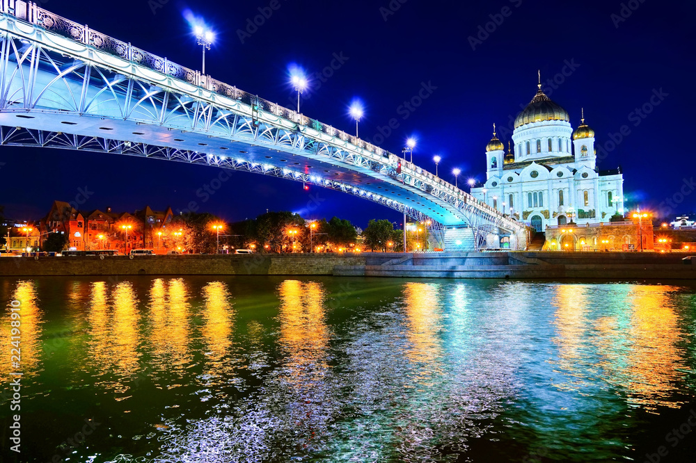 View of Cathedral of Christ the Saviour next to Moscow River at night in Moscow, Russia.